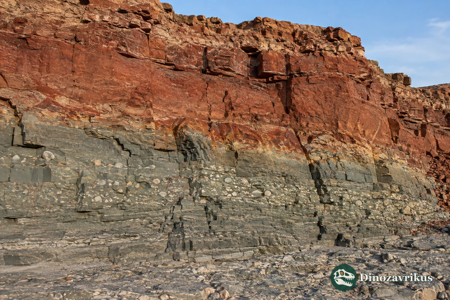 A transition from reduced grey-green rock to red oxidised Rhyacian sediment